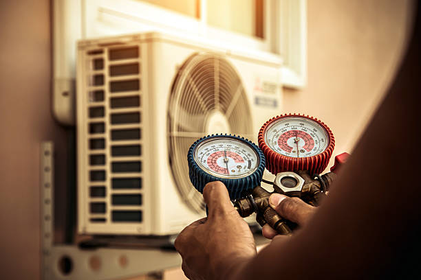 Professional Hvac technician working in Cumberland, MD